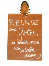 Rostiges Schild mit Spruch M Pinienzapfen