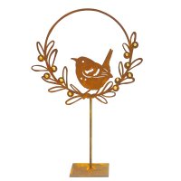 Edelrost Vogel mit goldenen Beeren auf Ständer Edelrost Vogel mit goldenen Beeren auf Ständer